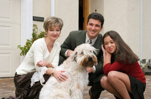 family with their dog