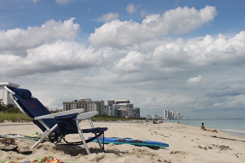 Beach chair sitting empty on a beach